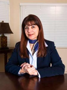headshot of Schahrzade Rezvani
