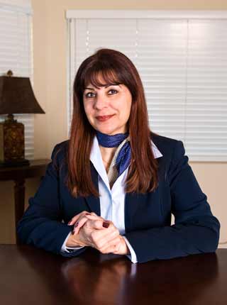 headshot of Schahrzade Rezvani