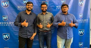 3 male students giving a thumbs up hand gesture