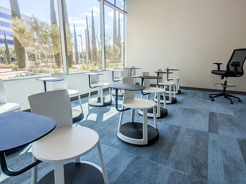 campus-designed-for-life-bsn Westcliff University, Corona CA, Nursing classroom with tall windows and open seating