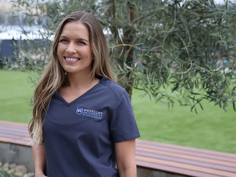 Westcliff Nursing student smiling on campus